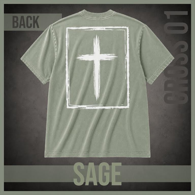 A sage green short-sleeve t-shirt shown from the back, featuring a large white distressed cross inside a rectangular border. The image includes text overlays reading 'BACK', 'SAGE', and 'CROSS 01' on a dark textured background.