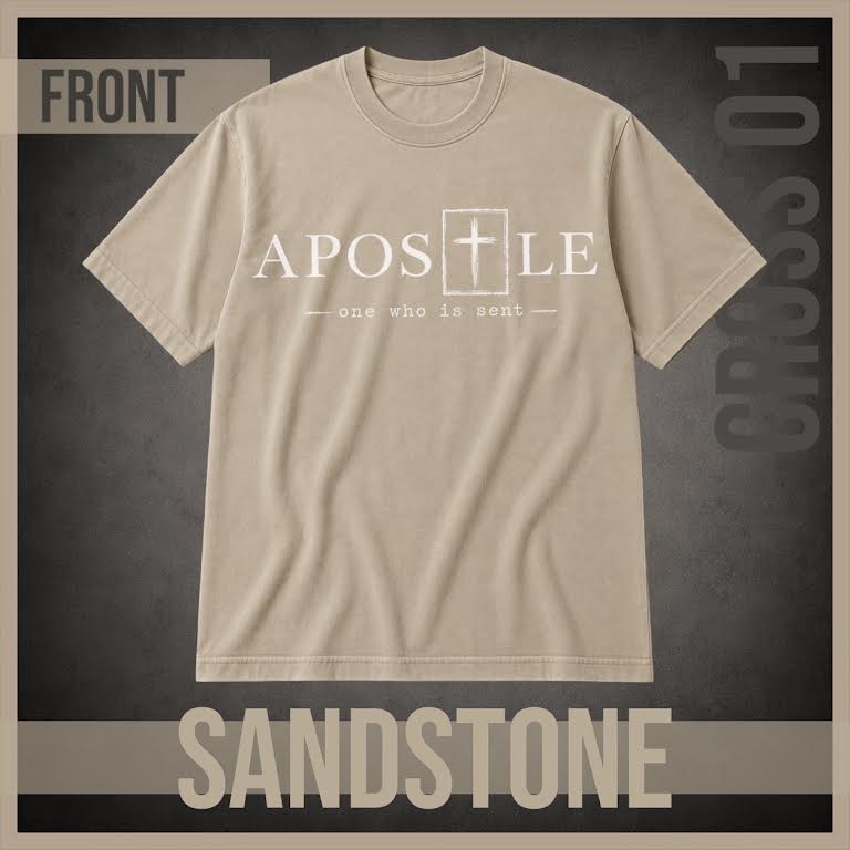 A beige crewneck t-shirt with a white graphic print reading 'APOSTLE' and 'one who is sent' with a cross symbol, shown on a dark textured background with 'FRONT' and 'SANDSTONE' text overlays.