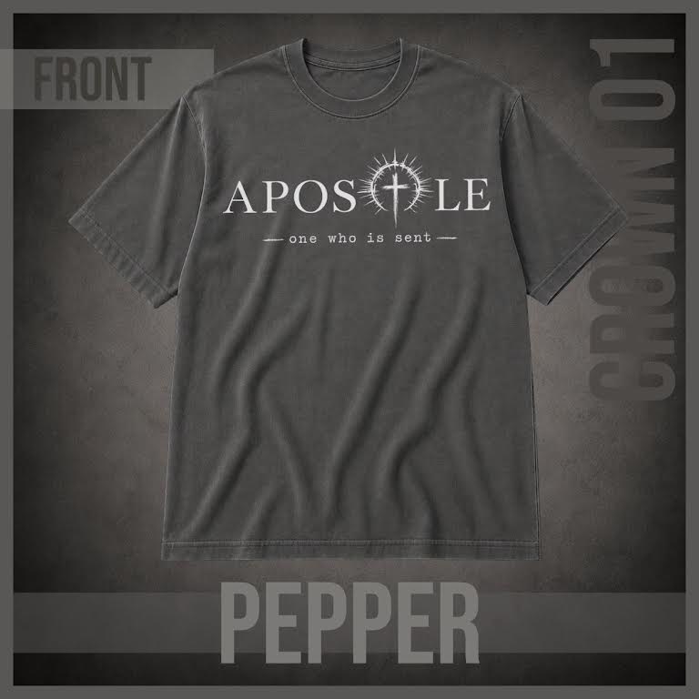 A black short-sleeve t-shirt with a white graphic print on the front reading 'APOSTLE' and 'one who is sent' with a cross inside the letter O. The image is presented as a product mockup on a textured dark gray background with 'FRONT' and 'BLACK' text overlays.